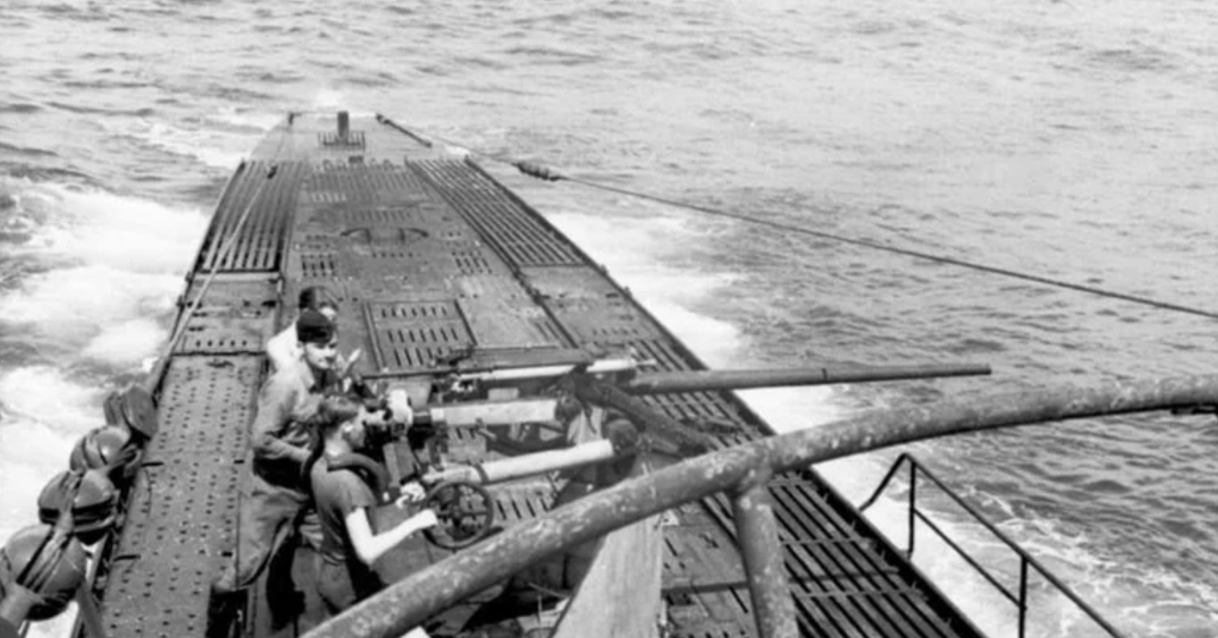 German soldiers aiming on top of the U-103 Type VIIB U-boat 